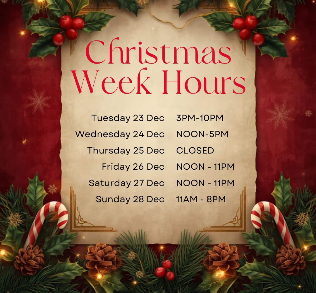 Sign with hours of operation for Christmas week